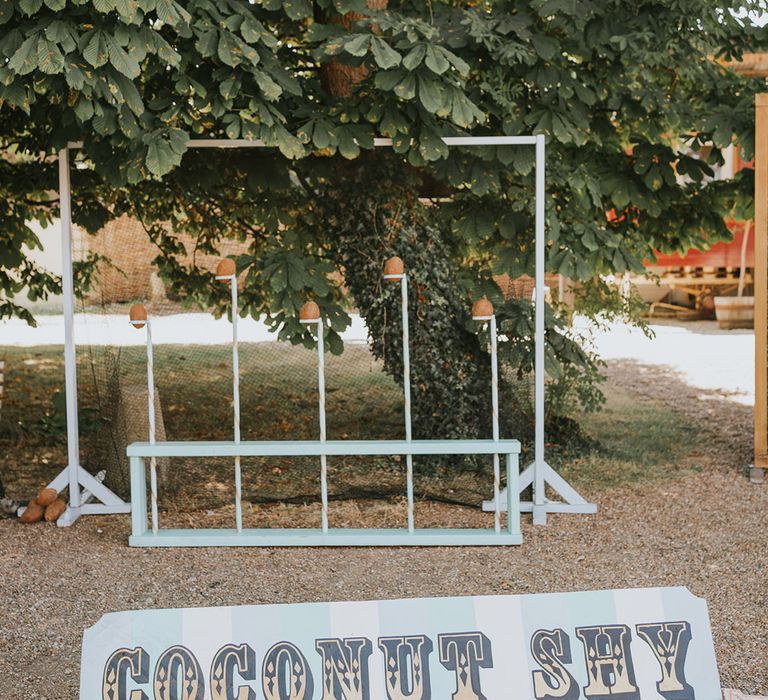 Coconut Shy wedding fairground game idea for a fun fair theme wedding 