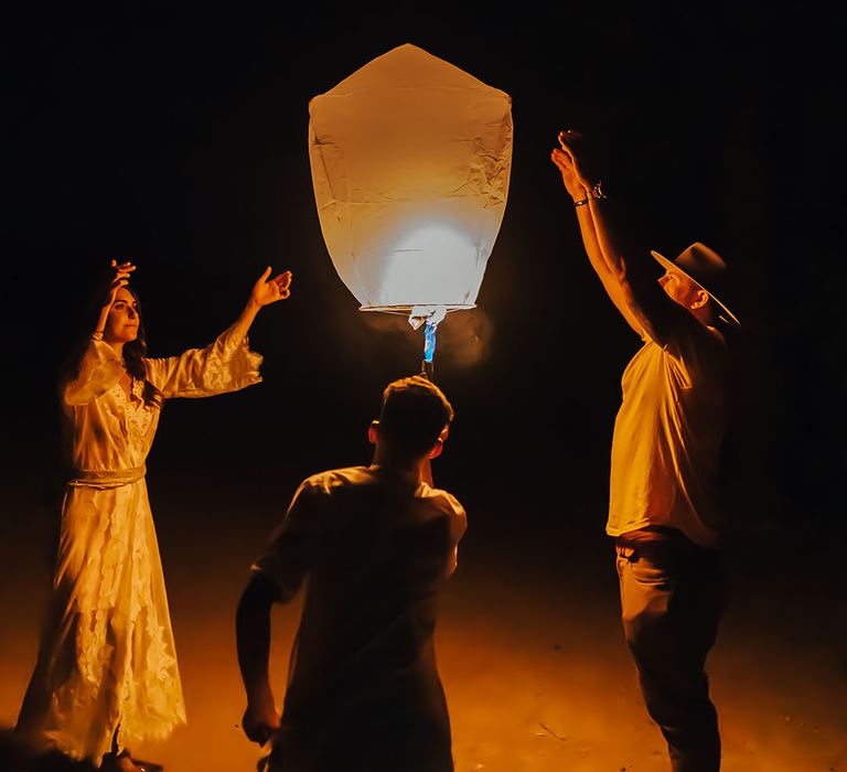 Wedding lantern ceremony in Morocco with the bride and groom sending it off