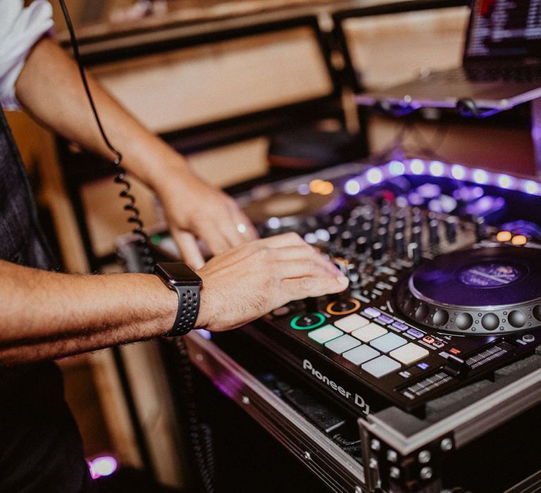 Wedding DJ plays at the tipi wedding reception 