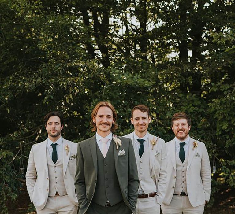 groom-with-groomsmen-cream-wedding-suits-Grace-Elizabeth