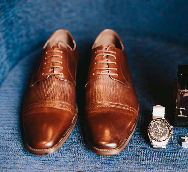 Brown wedding shoes and grooms accessories 