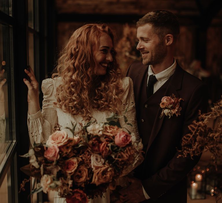 Bride with red curly wedding hair 