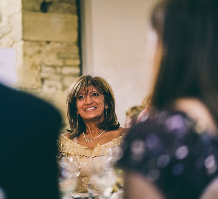 Wedding guest in gold outfit 