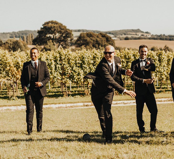 Wedding guests play lawn games