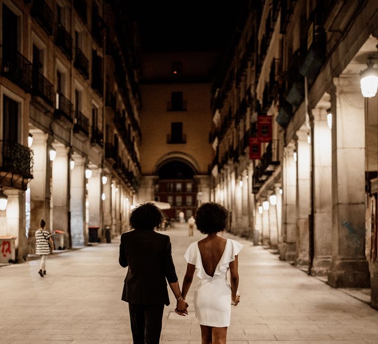 Bride & groom walk in Madrid 