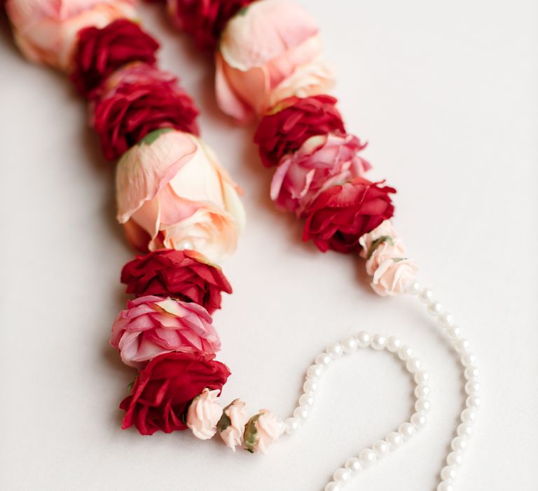 Floral garland in reds and white