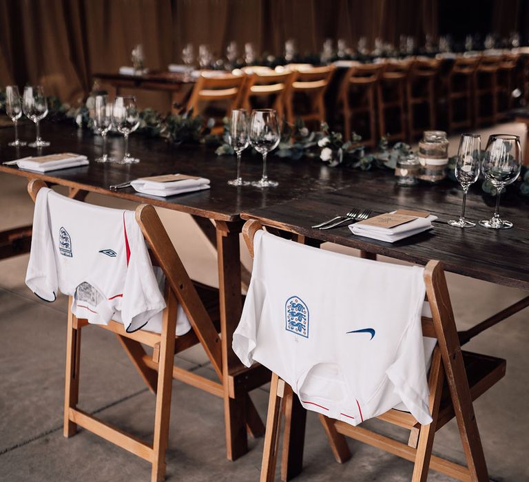 England football shirts on the bride and grooms chairs