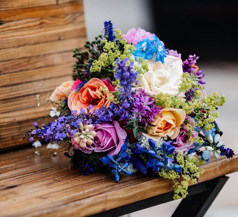 Colourful wedding bouquet with roses and stocks 