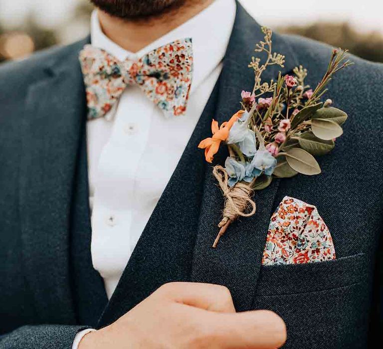 Patterned bow tie and pocket square with rustic buttonhole