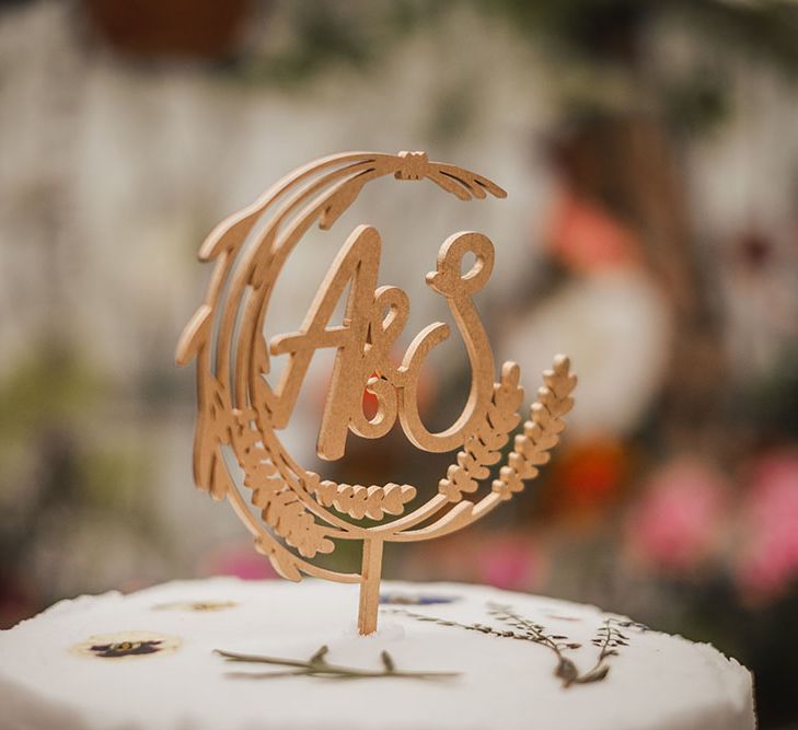 Personalised initial gold cake topper