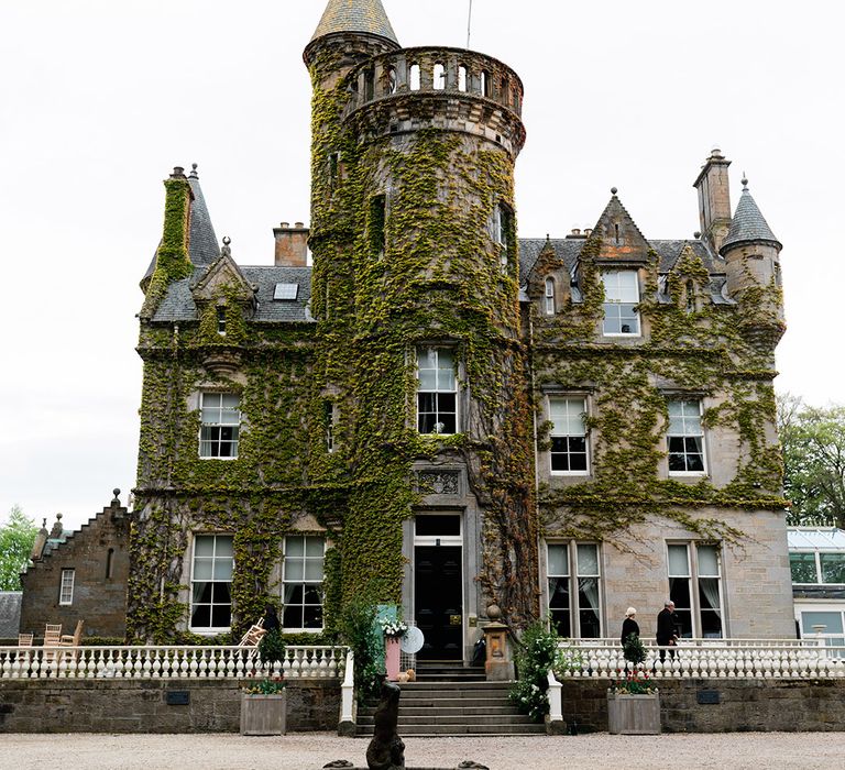 Carlowrie Castle wedding venue covered in green ivy 