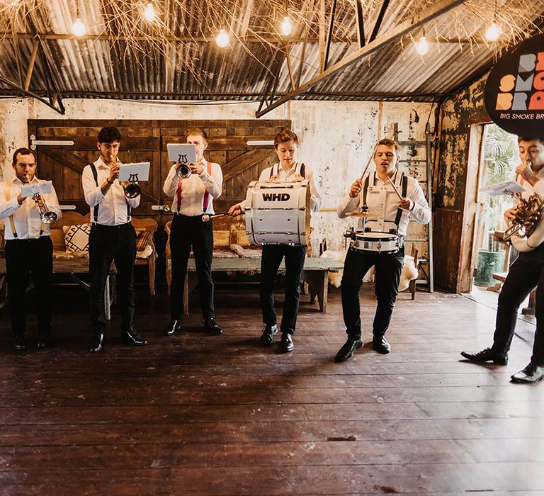 7 piece brass band plays at wedding ceremony