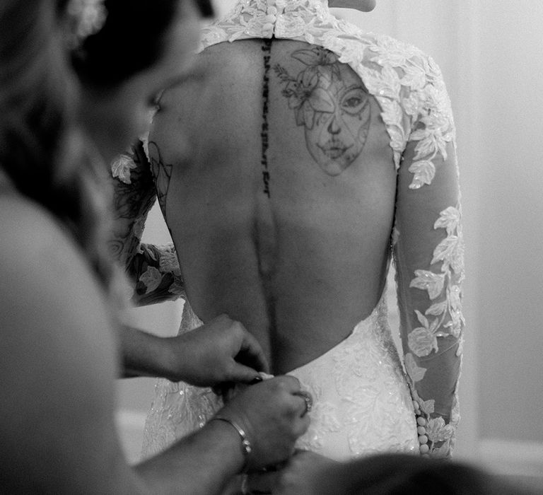 Open back lace wedding dress by Laura May Bridal 