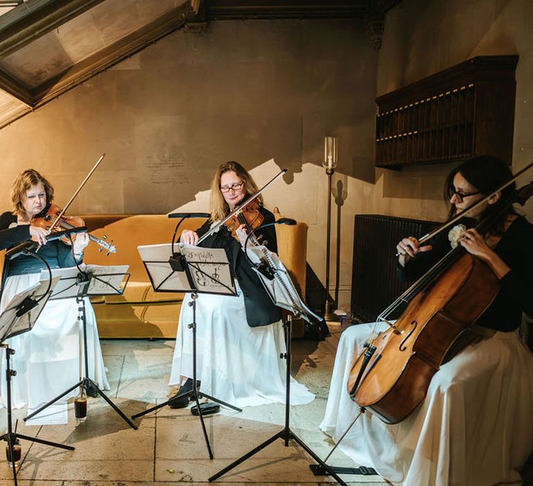 String quartet playing at wedding ceremony 