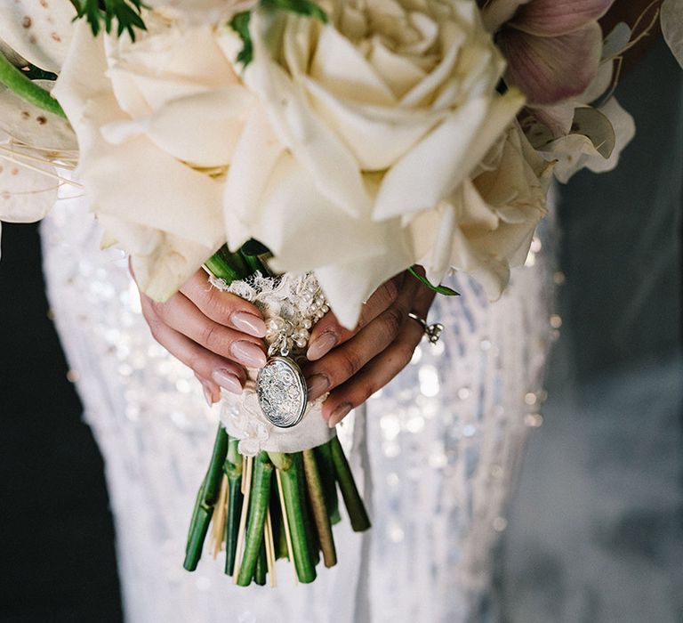 White rose wedding bouquet for the bride with personalised charms for the bouquet 