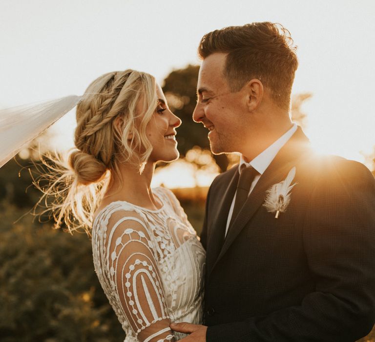 Relaxed bridal braided updo for micro wedding 