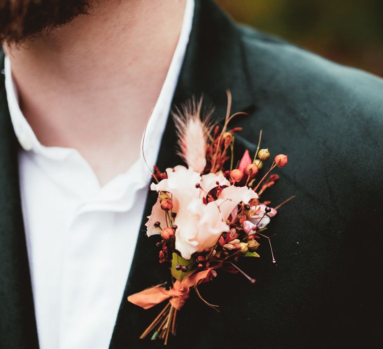 Close up of pink grooms buttonhole. Photography by Maryanne Weddings.