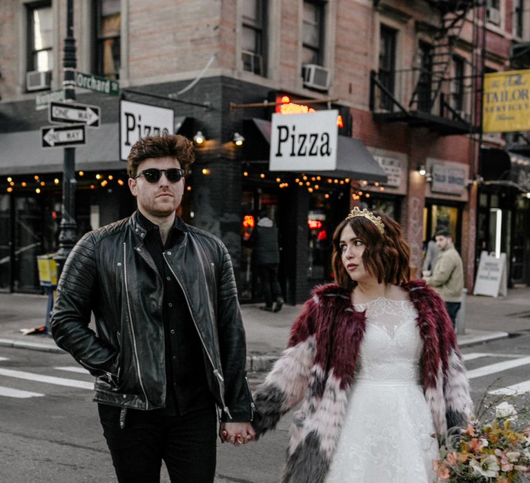 Bride & groom walk through New York wearing leather jacket and sunglasses 