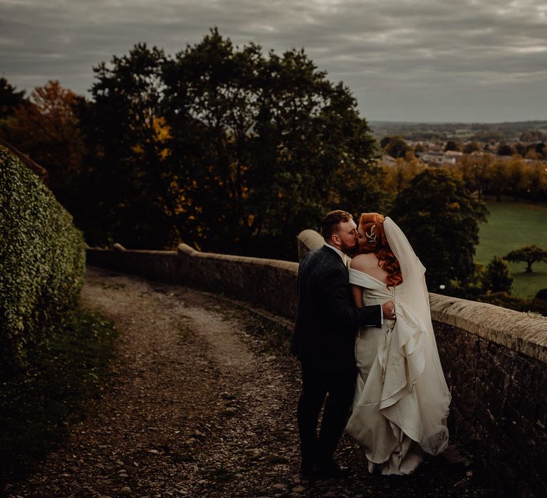 Bride and groom portrait at Clitheroe Castle by Louise Griffin Photography