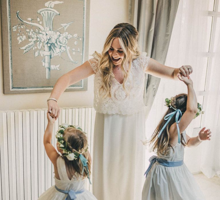 The bride and her flower girls at Le Mas De La Rose