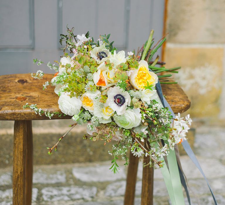 white anemone and yellow rose rustic French wedding bouquet 