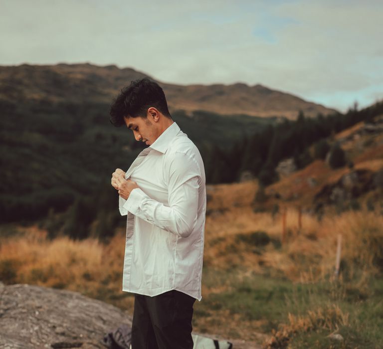 Getting ready on the mountains for engagement session