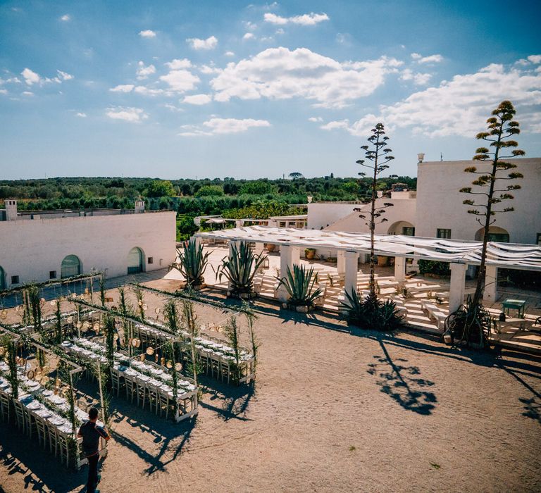 Rustic outdoor wedding reception at Masseria Potenti