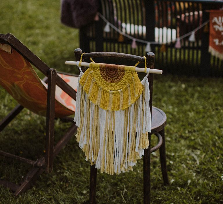 yellow macrame chair back decor for outdoor wedding 