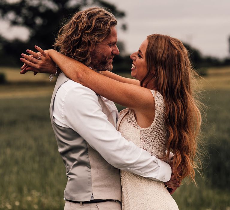 Bride and groom at barn wedding