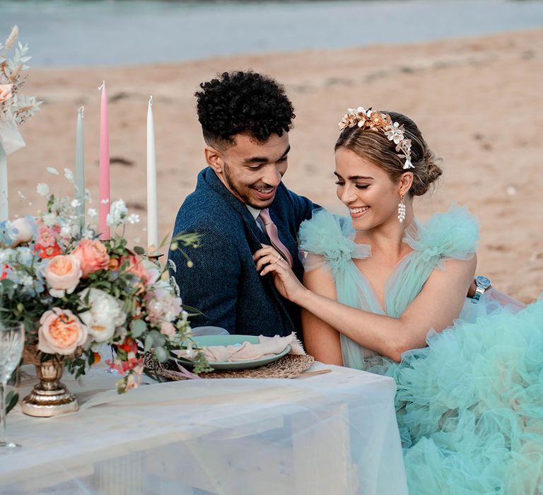 costal wedding inspiration at Botany Bay, Kent with bride in a mint green layered tulle wedding dress