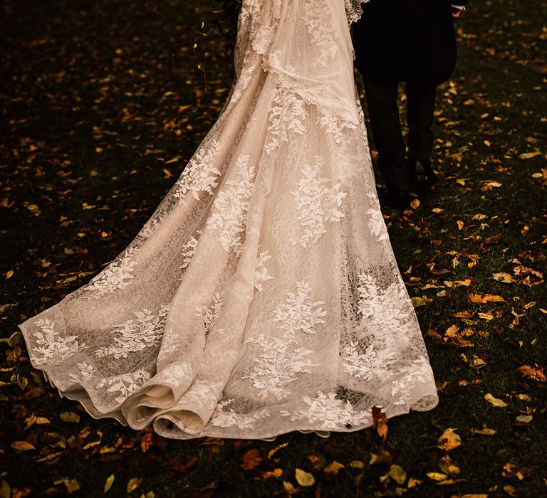 Lace detail wedding dress with off the shoulder sleeves