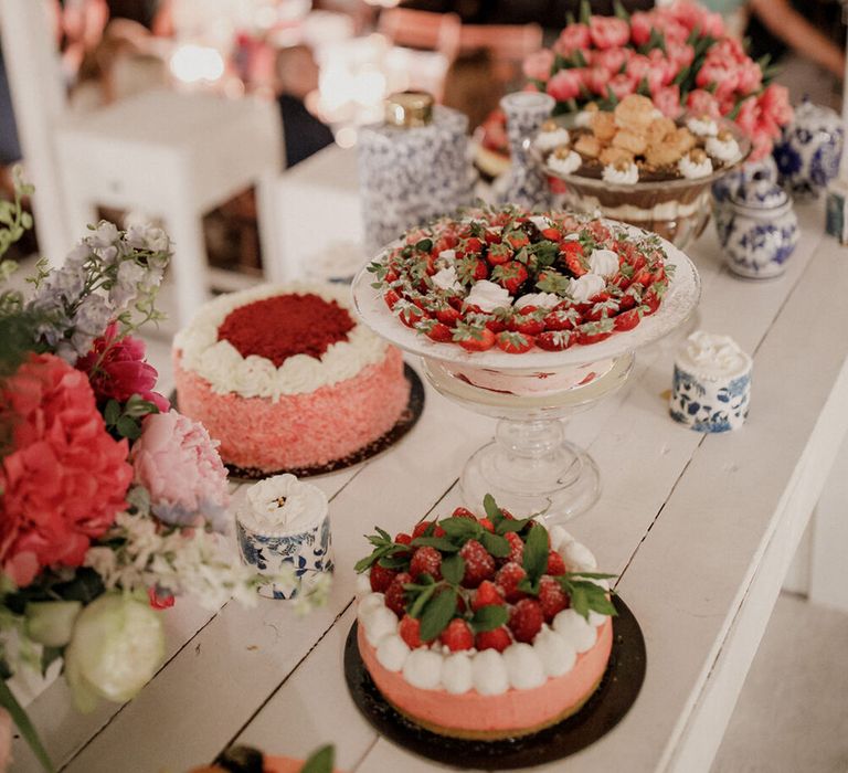 Dessert table on white wooden table