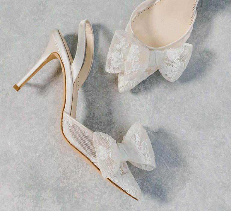 White slingback stiletto wedding shoes with sheer lace bow detail 