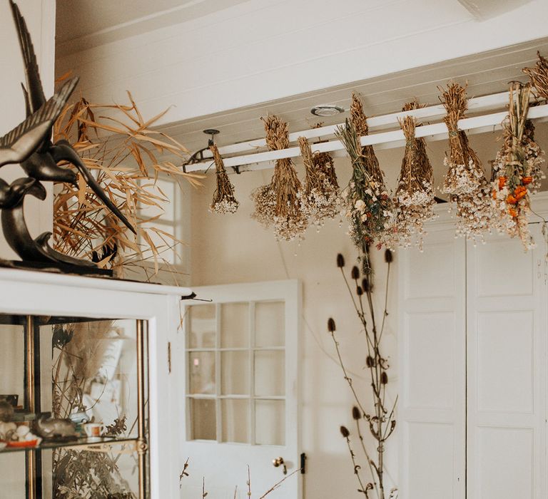 Dried wedding flower decorations at barn wedding venue in Herefordshire 