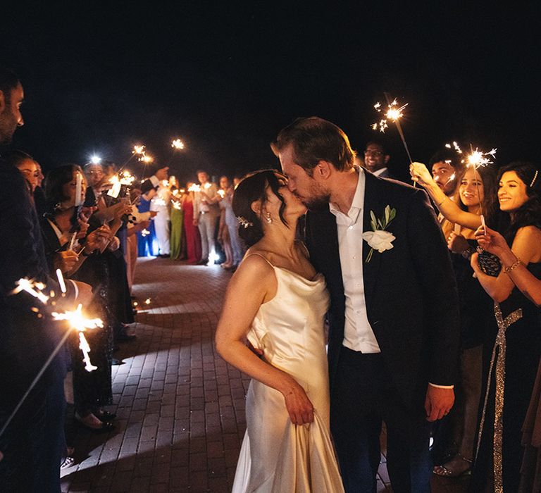 Bride and groom have magical sparkler send off moment 