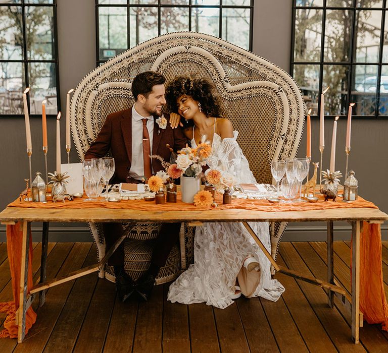 Sweetheart table with boho peacock chair 