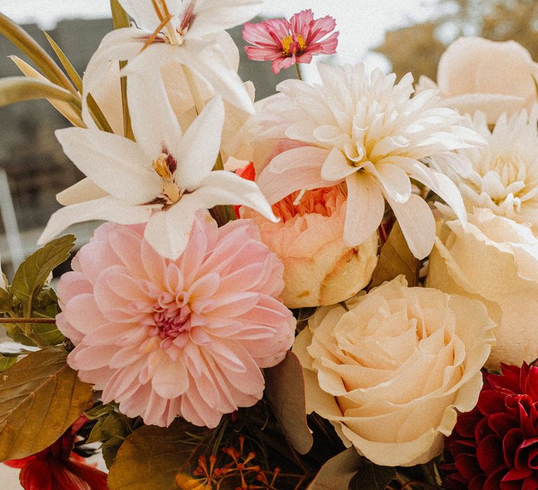 Ivory and pink dahlia and rose wedding bouquet