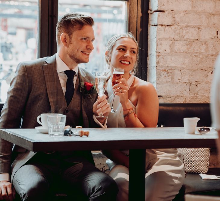 Champagne toast after intimate micro wedding 