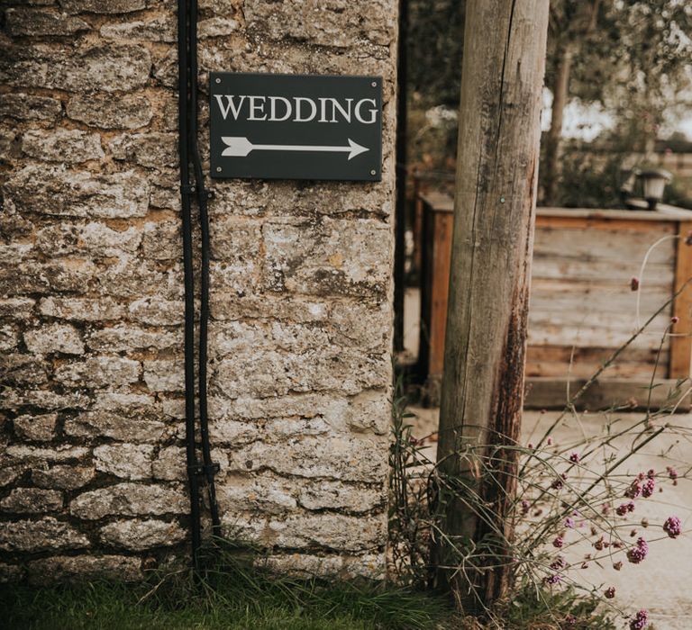 Sign for a rustic barn wedding