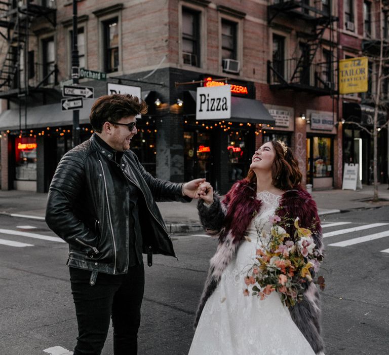 Bride & groom walking through the streets of New York 