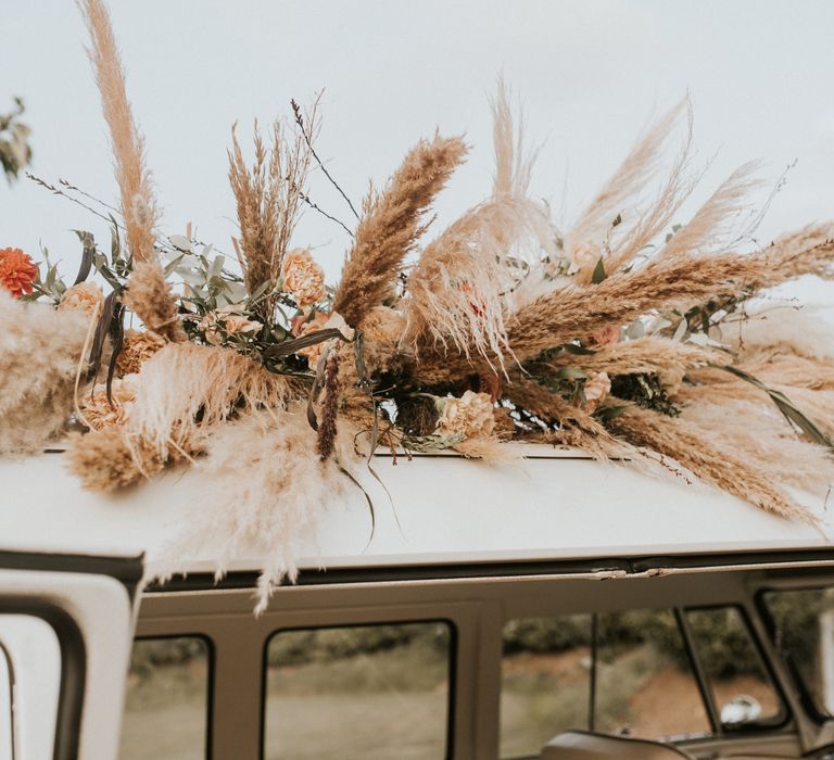 Pampas grass floral decoration on top of Camper Van 