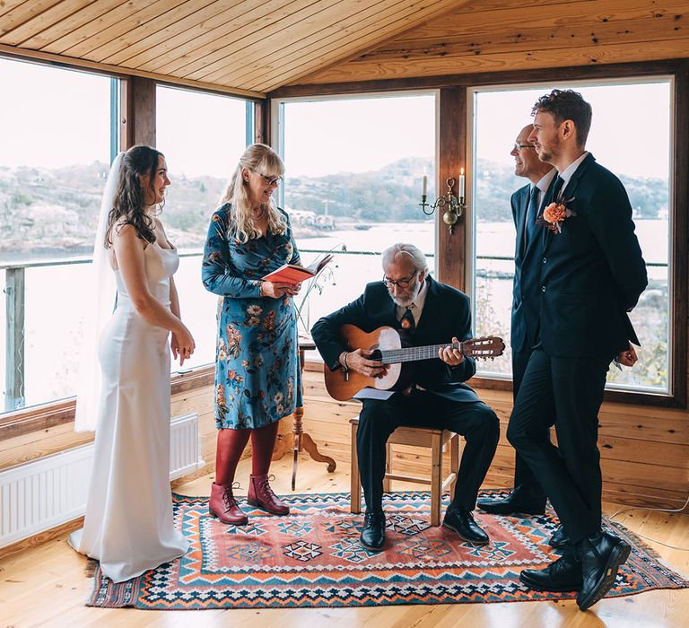 The bride and grooms parents sang and played guitar