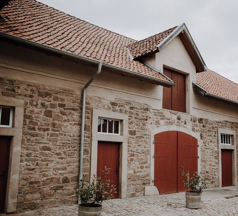 Rustic stone barn exterior for rural German wedding