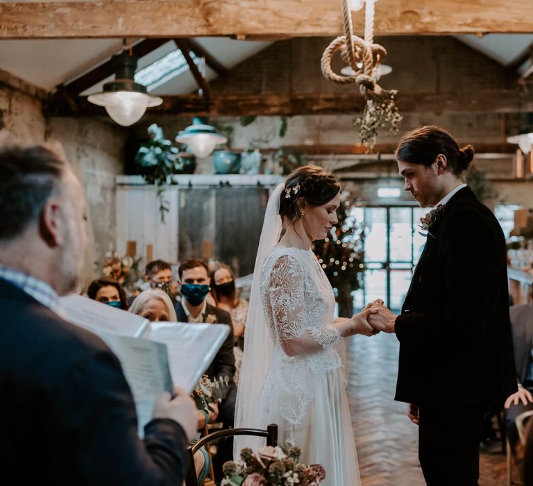 Bride and groom getting married at Clapton country club festive wedding