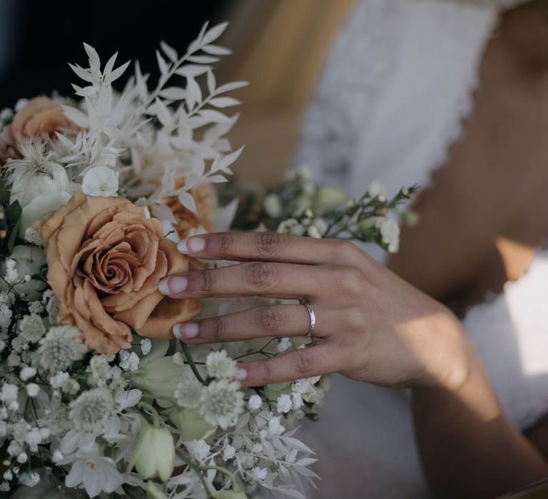 Peach garden rose, eucalyptus, baby's-breath and dried flower wedding bouquet 