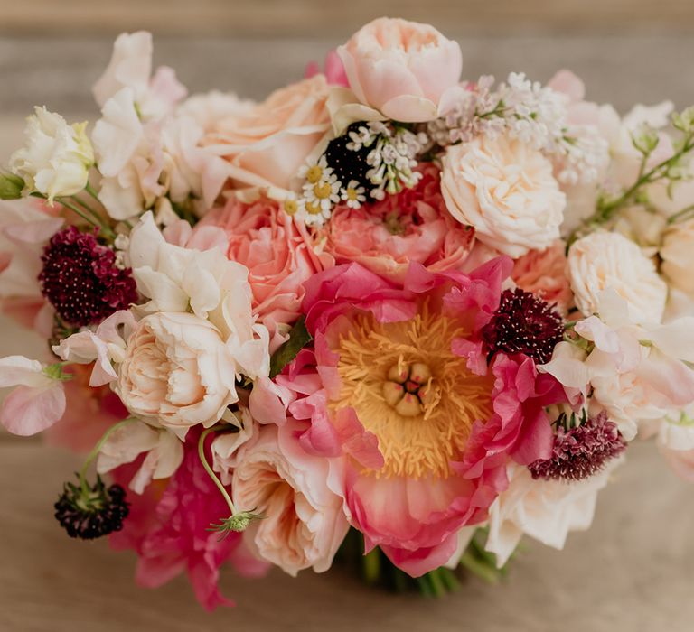 Wedding bouquet full of pink chinese peonies and blush peonies