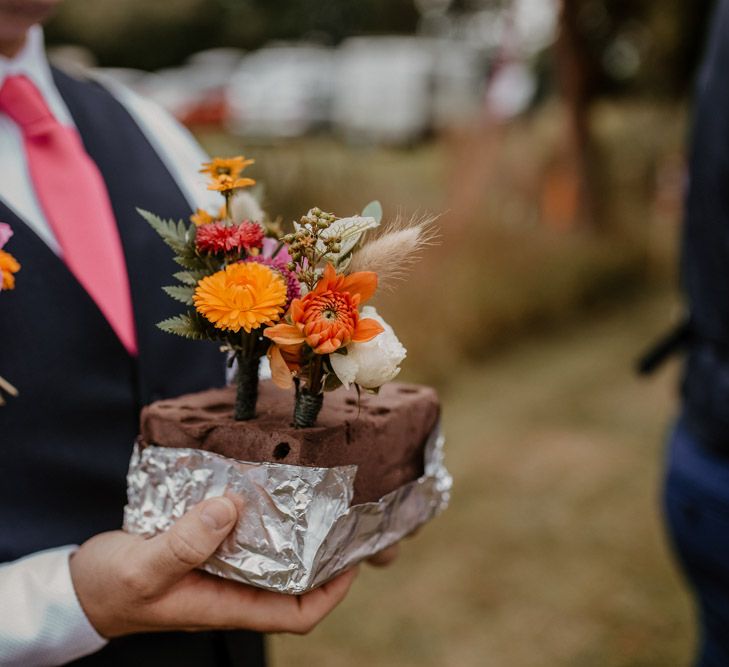 colourful flower buttonholes 