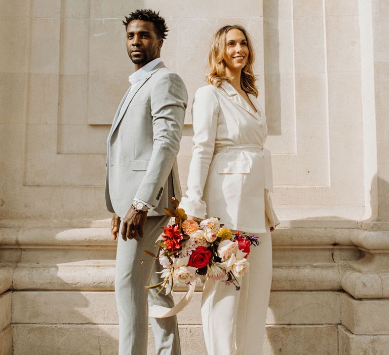 Wedding photography of stylish bride and groom at Portsmouth Guidhall city elopement