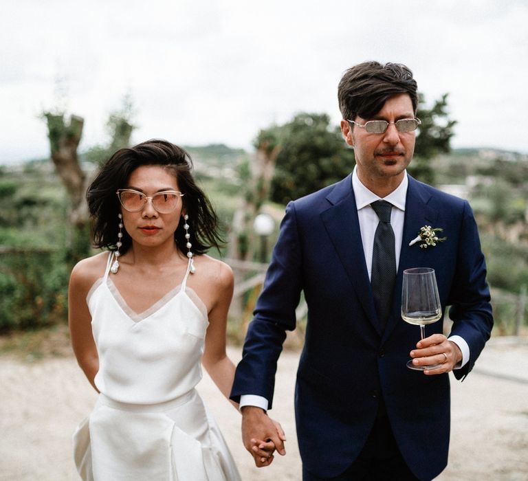 Stylish bride and groom at Italian destination wedding 