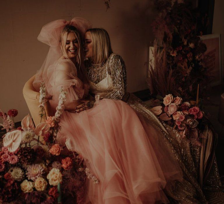 Lesbian wedding shoot with brides in pink gowns